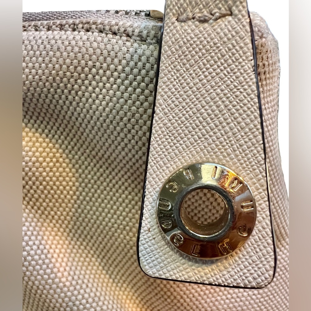 Henri Bendel Jetsetter convertible backpack with purple interior lining. - Picture 5 of 15